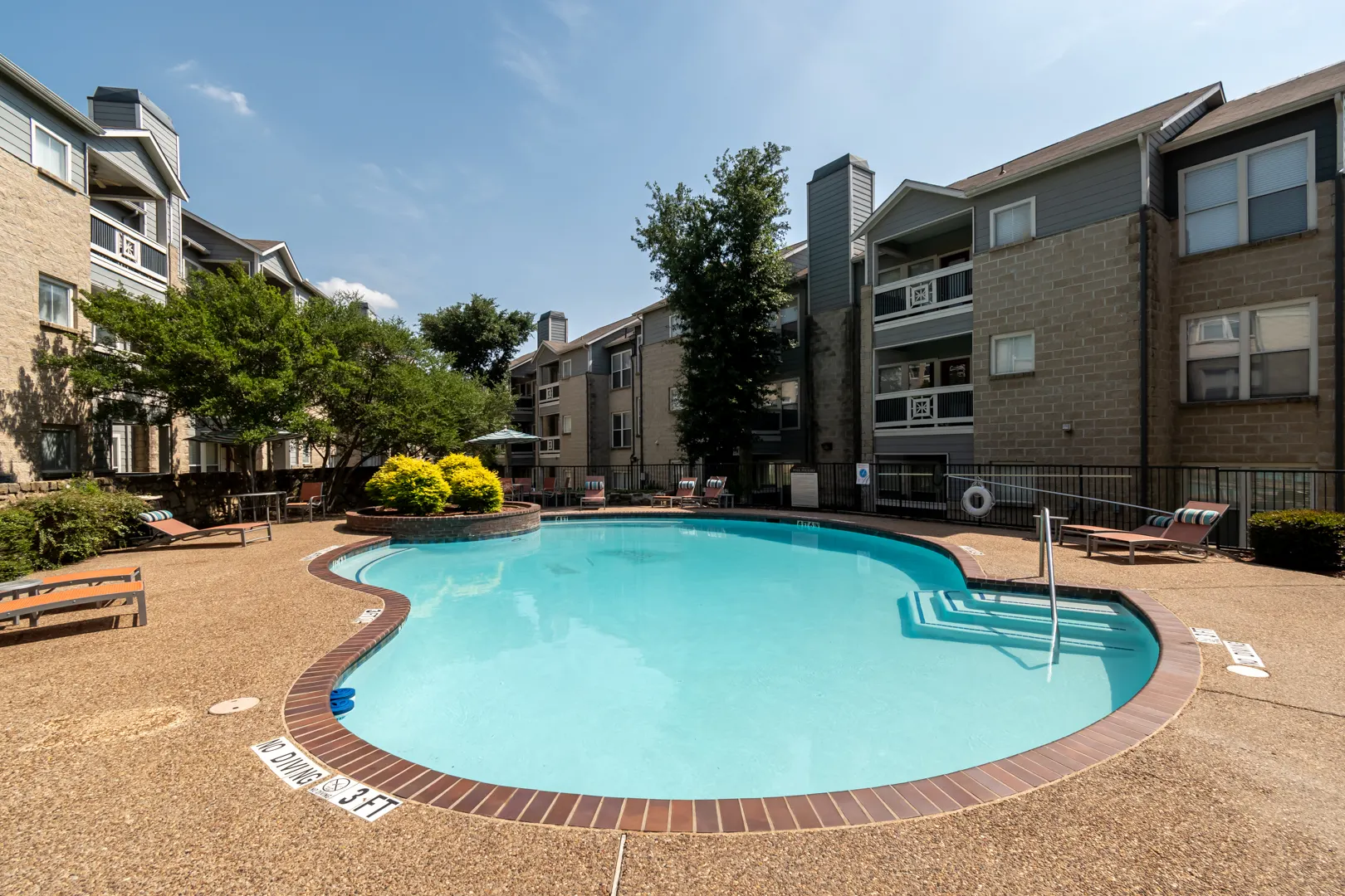 Covered outdoor kitchen and BBQ grills at Western Station at Fossil Creek in Fort Worth, Texas