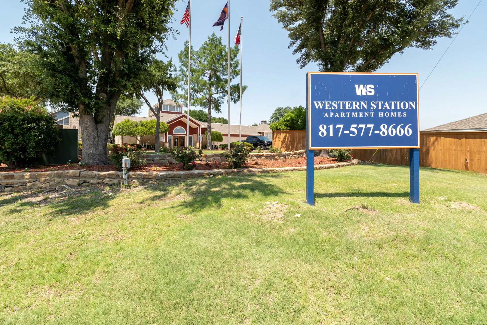 Property entrance and community signage at Western Station at Fossil Creek in North Fort Worth, Texas