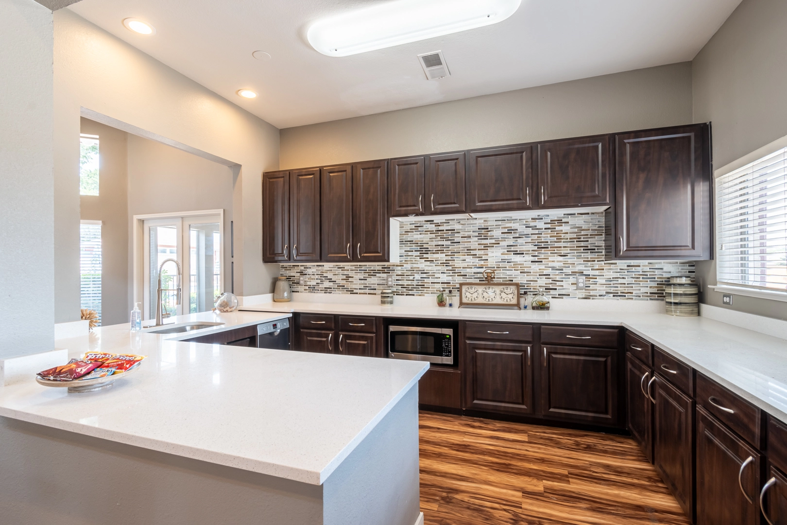 Apartment kitchen with full range appliances at Western Station at Fossil Creek in Fort Worth, Texas